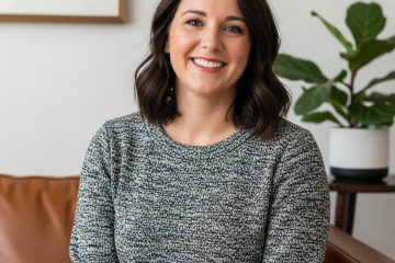 Colleen Langdon, a designer in a warm, edited living room that reflects her calm, livable design approach.